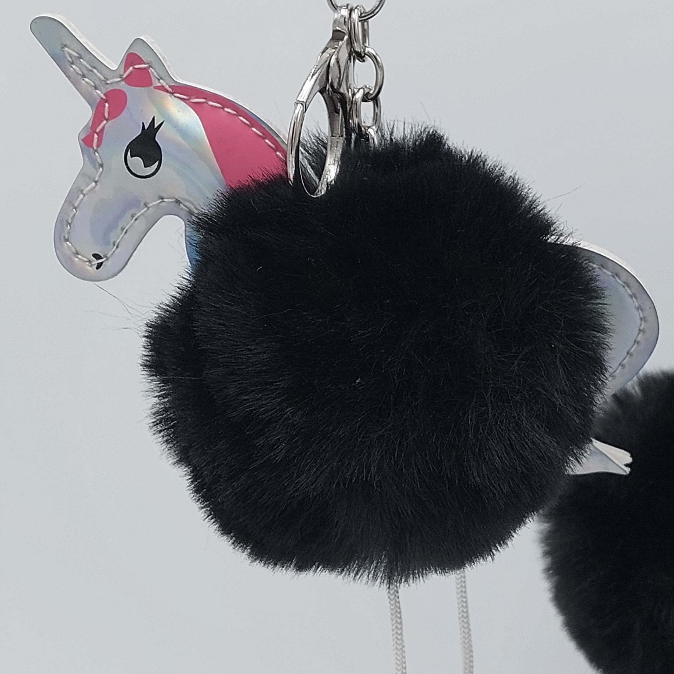 Tashanger Unicorn met zwarte Pompom