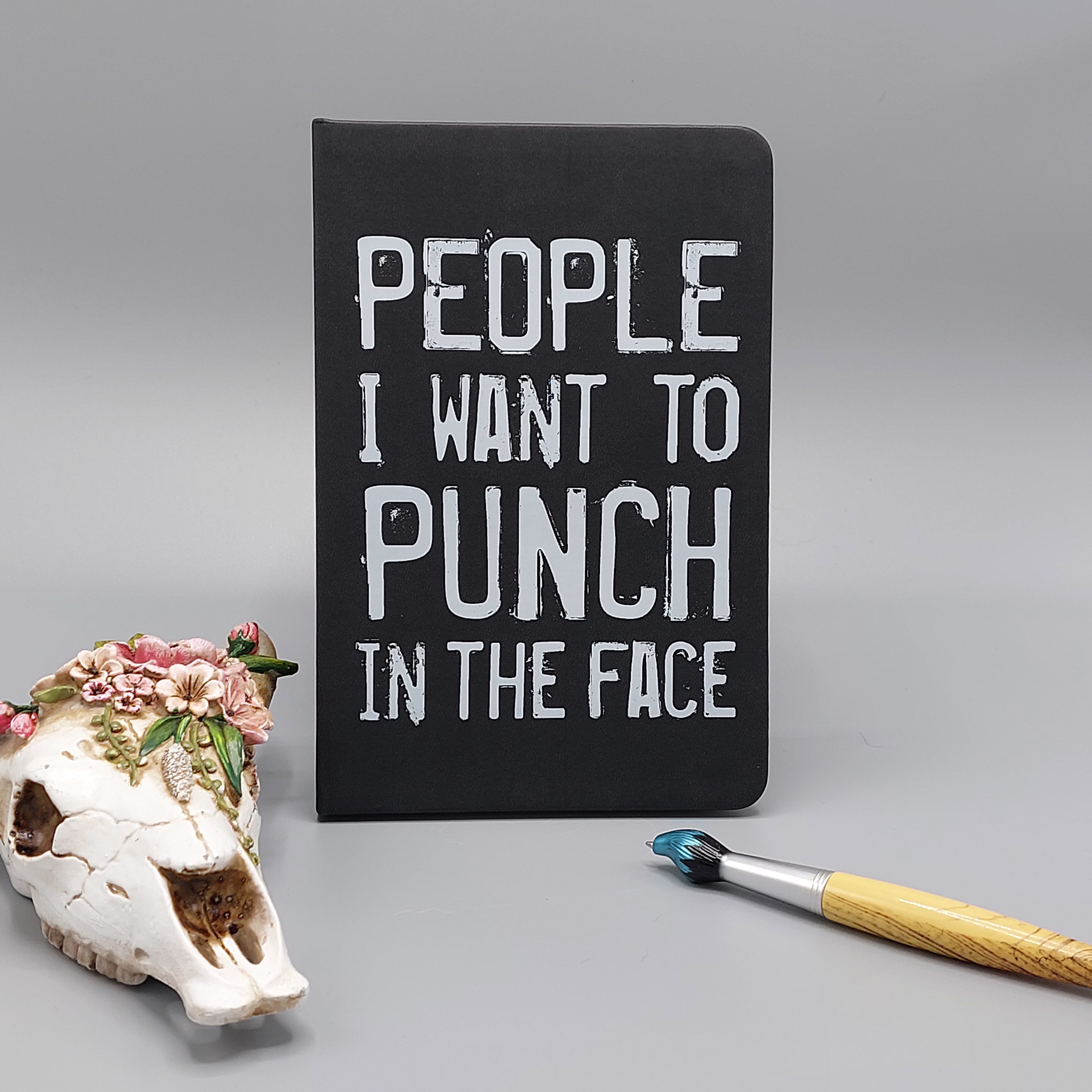 Notitieboek 'People I want to punch in the face'